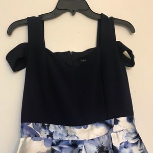 Women’s size 8 evening gown dark blue with floral bottom.